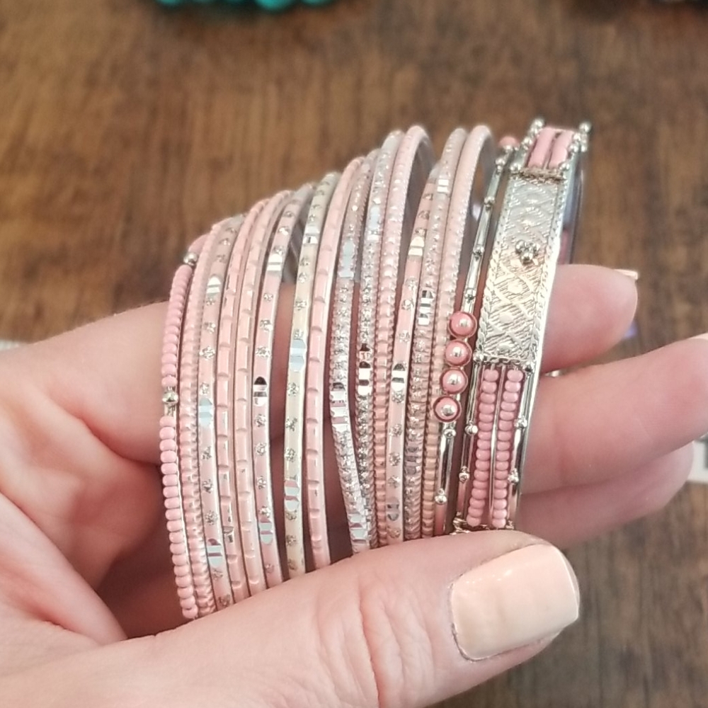 Lot of 16 pink and silver bangles